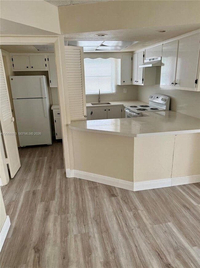 Photo - 9390 E Bay Harbor Dr Unit 10