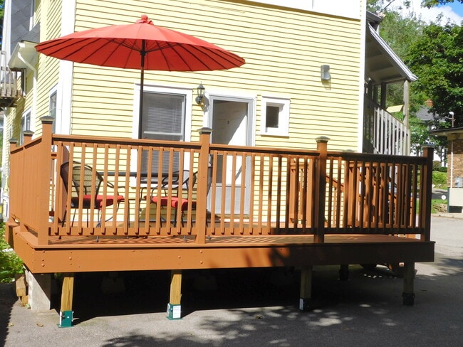 Backyard porch with patio furniture - 429 Stanwood St Unit 1