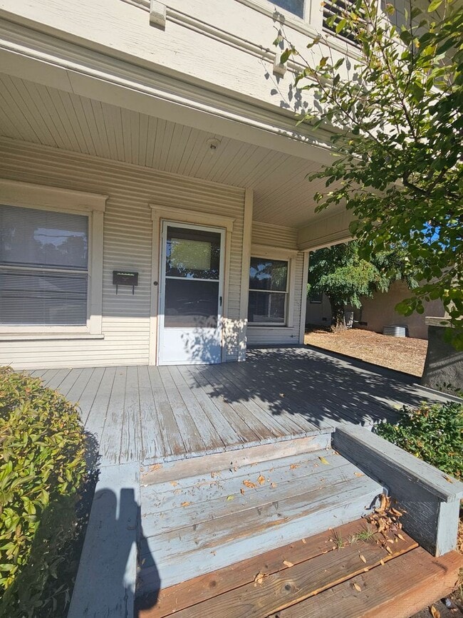 Photo - 1/2 OFF FIRST MONTH'S RENT IF RENTED IN DEC! Charming 2 Bedroom with Bonus/Laundry Room