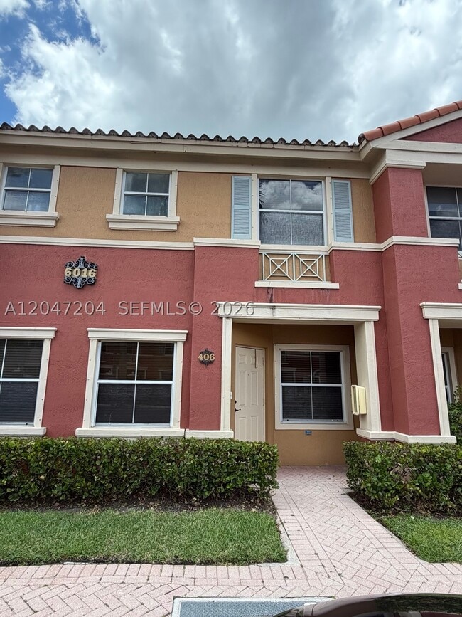 Building Photo - 6016 NW 116 Pl Unit 406