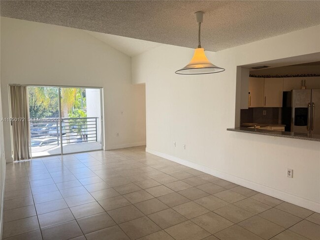 Building Photo - 9705 Fontainebleau Blvd Unit B209
