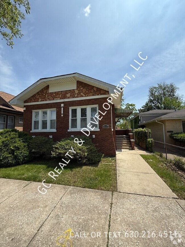 Building Photo - 10119 S Peoria St Rental