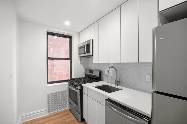 Photo - 97-25 64th Ave