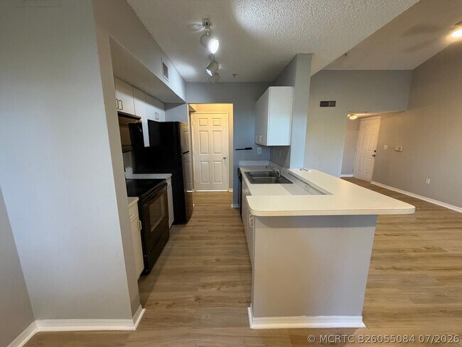 Building Photo - 3830 Lyons Rd Unit 304-3