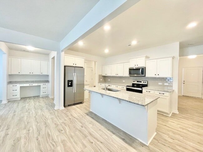 Photo - 3 br 2.5 ba with spacious loft home 2 car garage Ready APRIL 24TH