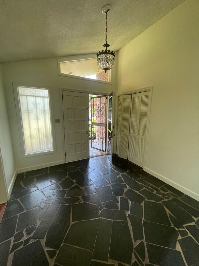 Photo - 2 bedroom 3 bath Mid- Century style home! This home has a wonderful outdoor area great for Enter...