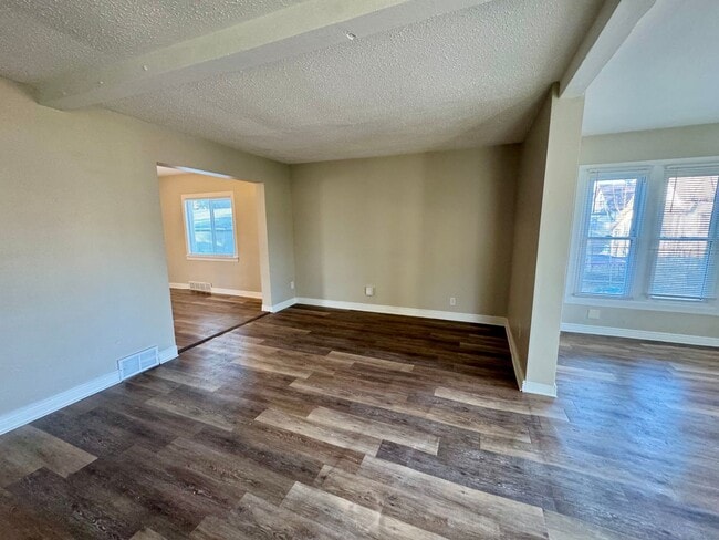 Photo - Beautiful 3 bedroom, 1 bath single family home with large fenced yard/ Garage /Central AC / Appli...