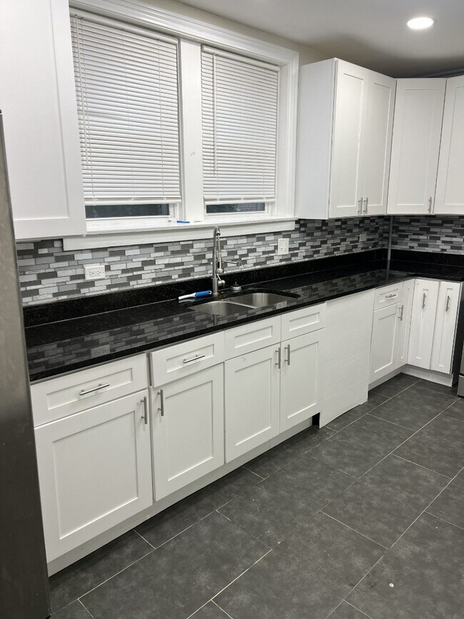 Photo - Charming 3-Bedroom Home | Updated Kitchen | Shared Laundry Unit 2