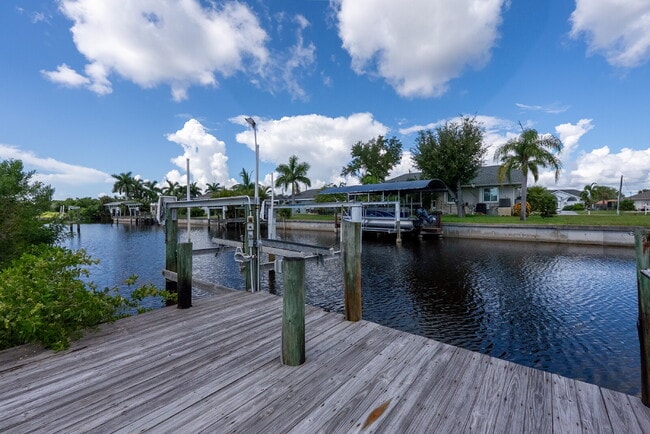 Photo - 3 BEDROOM • 2 BATHROOM • PRIVATE POOL • WATERFRONT • BOAT LIFT • ZERO DEPOSIT MOVE-IN AVAILABLE