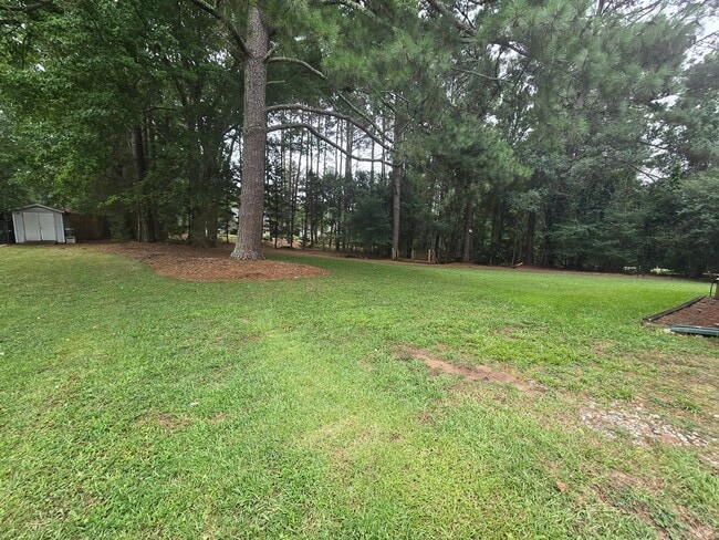 Photo - Quiet Neighborhood- Large Lot- Shed- Enclosed Sunroom! Community Pool & Tennis Courts!