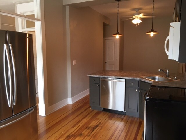 Kitchen looking into living room - 219 5th St Unit 201