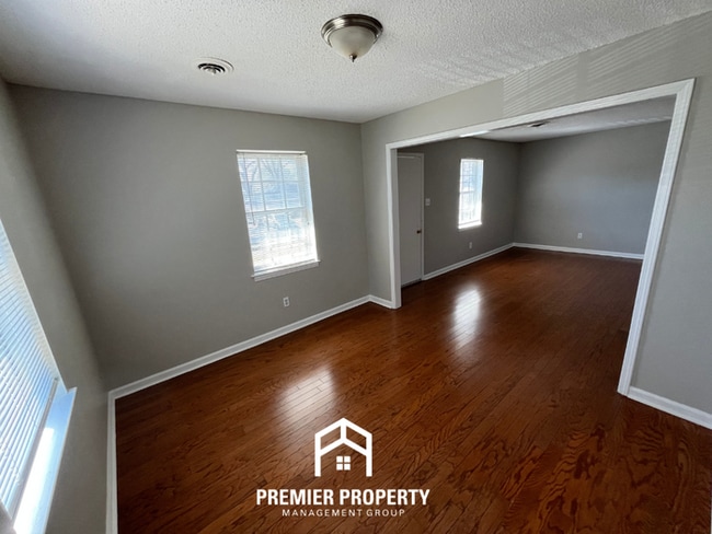 Photo - Charming 3BR Home in 38118 | Hardwood Floors & Spacious Fenced Backyard