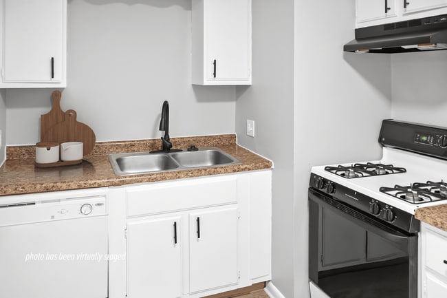 Enjoy a Gas Range and Dishwasher