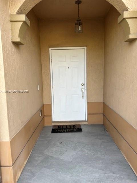 Building Photo - 10850 NW 82nd Terrace Unit 7-5