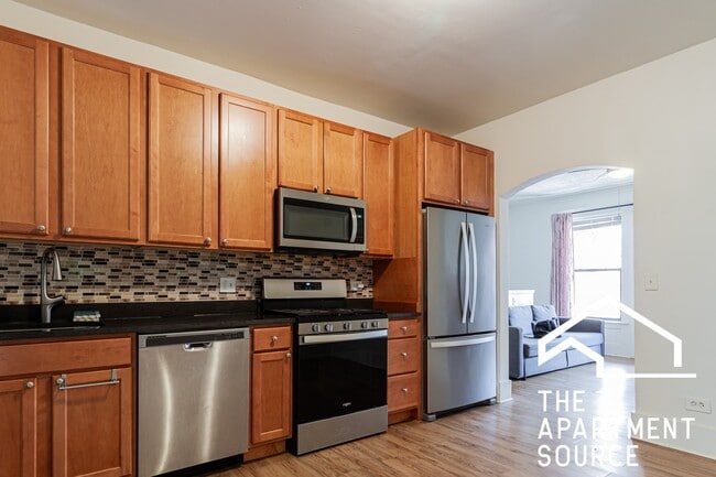 Building Photo - 908 W Belle Plaine Ave