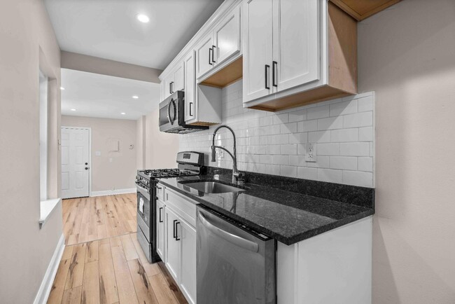 Building Photo - 219 N Patterson Park Ave Rental