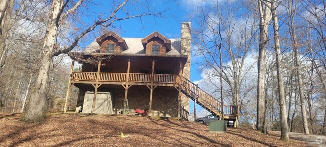 Building Photo - 2 bedroom 1 bath fully furnished log cabin... Rental