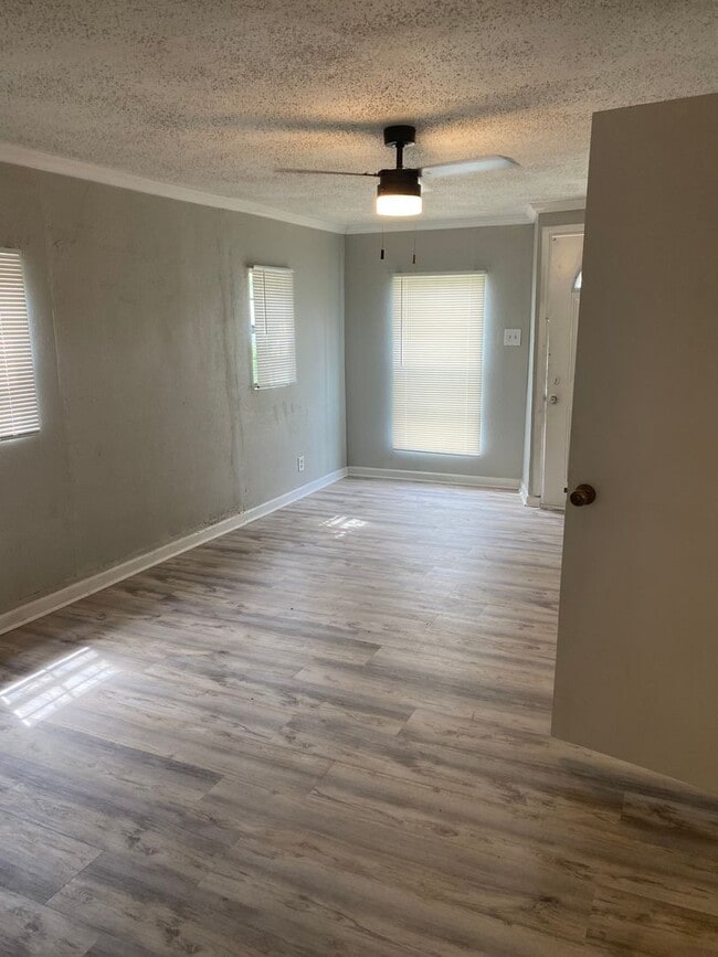 Photo - 2 Bedroom Home  with Fenced In Backyard 199.00 first month's rent