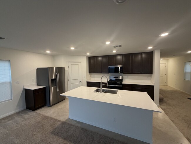 Photo - Stunning 4-Bedroom Home with Loft & Den – Spacious and Move-In Ready!