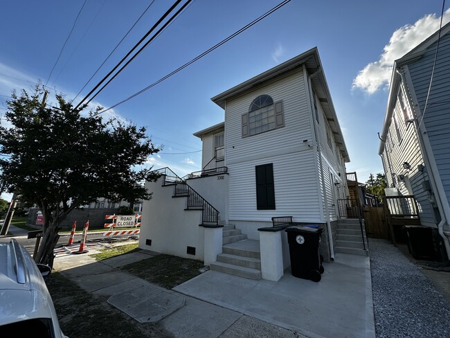 Front of house on Nashville Avenue. 1st floor Apartment entrance on side. - 3300 Nashville Ave Apartments Unit 3302 Nashville