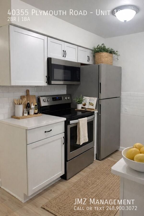 Building Photo - 40355 Plymouth Rd Unit 101