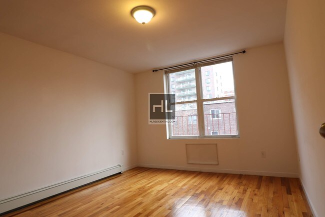 Photo - Woodside blocks from the 7 & lirr 43 AVENUE Unit 2