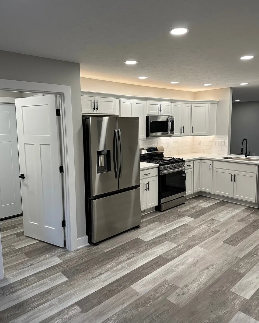 Kitchen door leads to laundry/garage - 8195 Lake Pleasant Rd