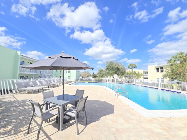 Diving into serenity, one splash at a time! - Marina Vista Apartments