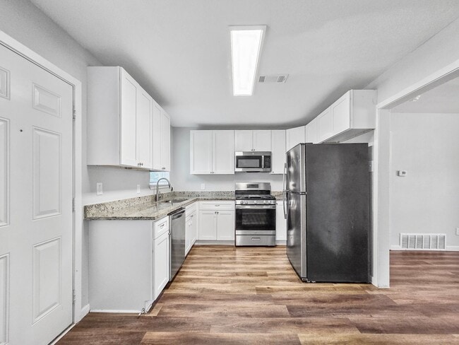 Photo - 3 BR/1BA | Updated Single Family Home | 1-Car Covered Parking | Gated backyard !