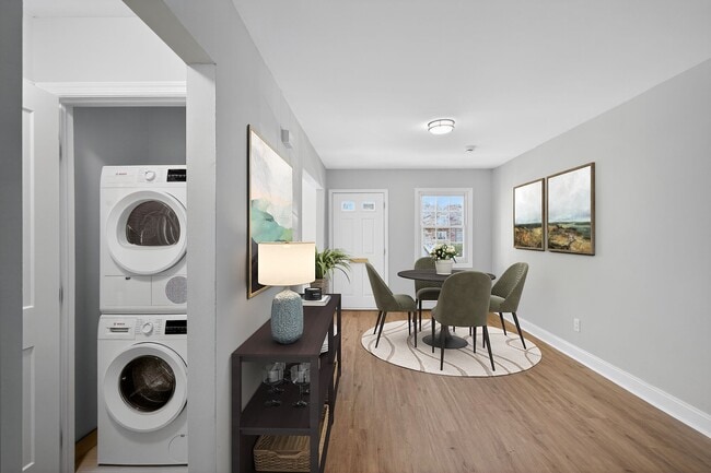 Step into the inviting interiors of Eagle Rock Apartments at Woodbury. With a modern dining area, convenient in-unit laundry, and natural light streaming through large windows, this is your perfect home. Schedule a tour today to see for yourself!