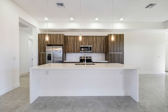 Photo - Brand-New Coastal Retreat | 4BR Home in NW Cape Coral