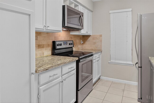 Photo - 10555 Turtlewood Ct Unit 2305