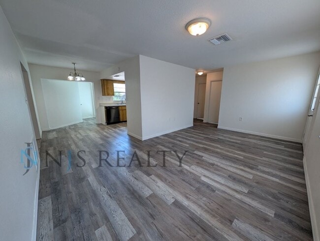 Photo - 3/2 over 1000sf home with New flooring, FRESH paint, open floorplan, primary suite with private b...