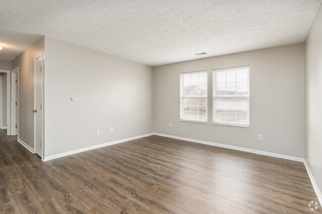 2BR, 2BA - 990SF - Living Room Mid Upgrade - Leafy Dell Apartments