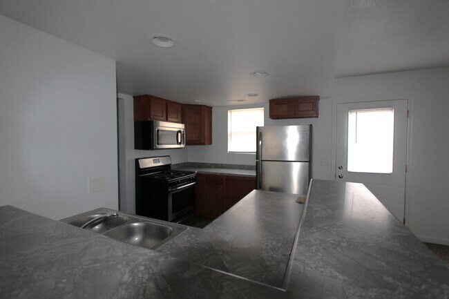 Cocina - Candlelight Apartments & Condos