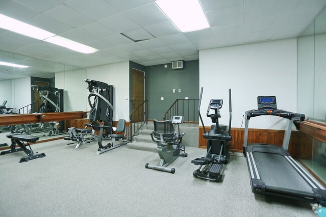 Fitness center - Le Chateau Apartments Unit 436