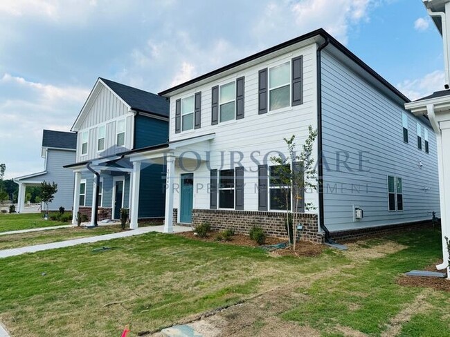 Photo - Modern 4-Bed / 2.5-Bath Single-Family Home with Loft, Gas Fireplace & 2-Car Garage – Near Downtow...