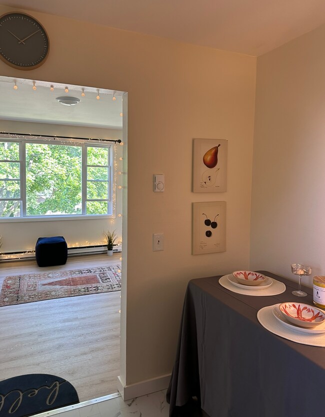 Kitchen exit into living room - 91 Faith St Unit 91