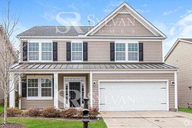 Building Photo - Feel welcome in this well-maintained 4BR 2... Rental