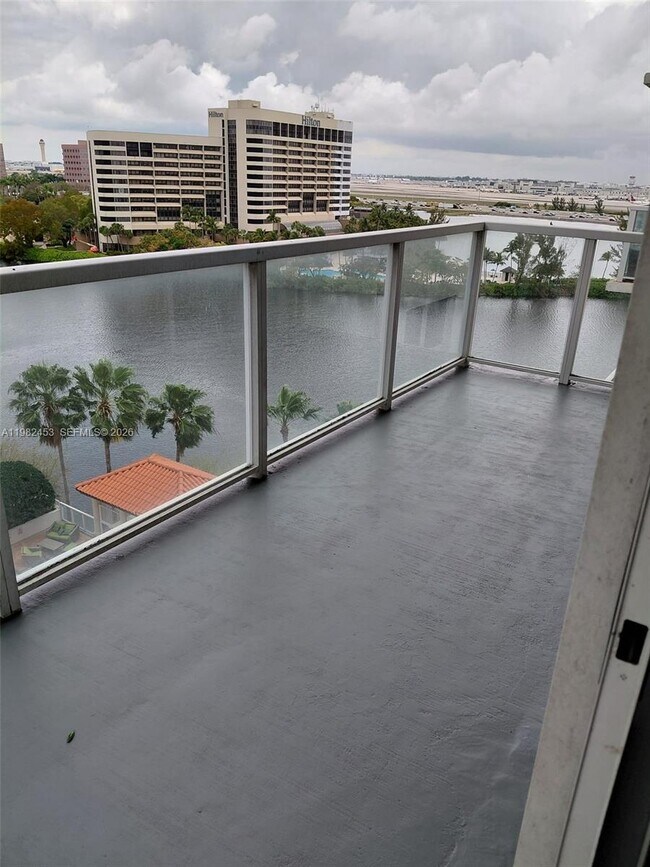 Building Photo - 5077 NW 7th St Unit 1006