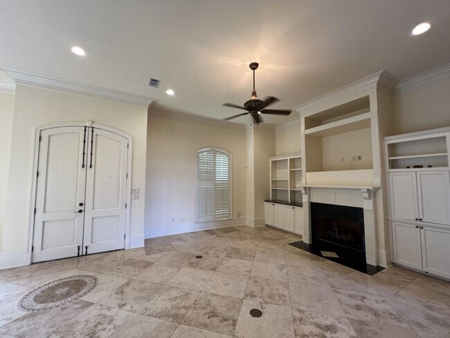 Photo - Elegant Two-Story Home with Outdoor Kitchen in Desirable Shadows Lake