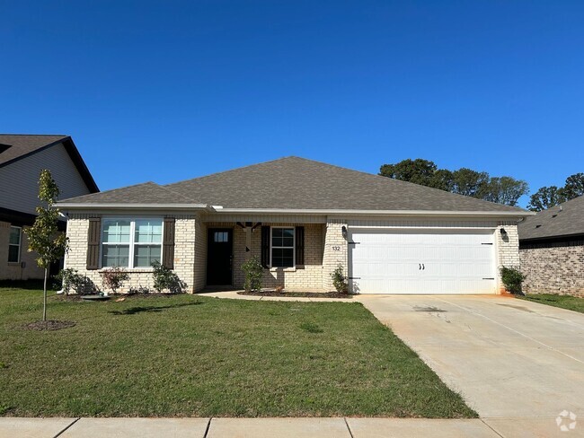 Building Photo - All on ground level comfort in a four bedroom Rental