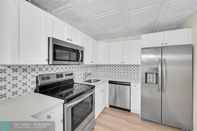 Photo - 470 NW 20th St Unidad 3090 Rental