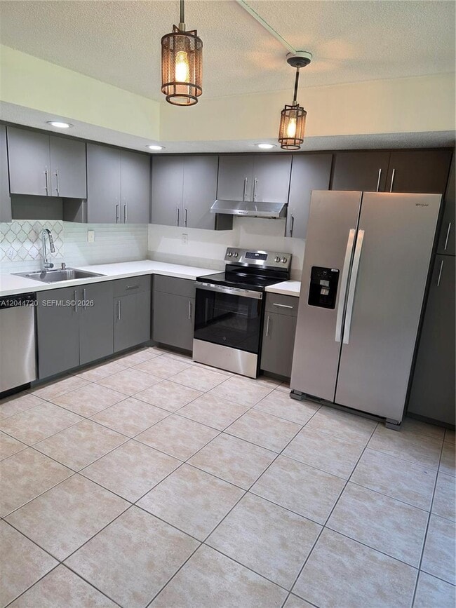 Building Photo - 8065 SW 107th Ave Unit 214