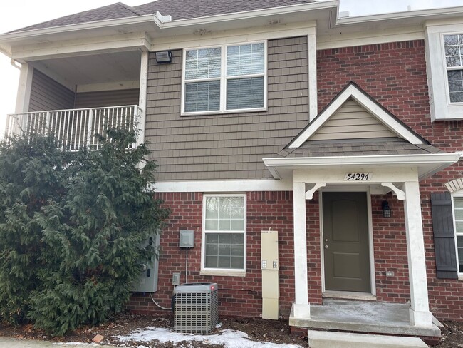 Building Photo - REDUCED $50! Shelby Township, 2-Bedroom, ... Rental