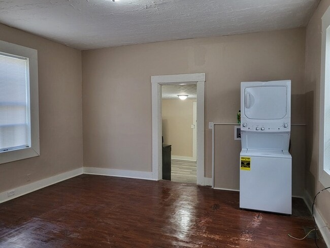 Photo - Cozy, clean, stove, fridge, and washer/dryer