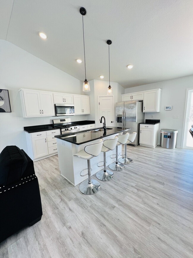 Photo - Newer Development Home Spacious 4-Bedroom 3 Bathroom Single Family Home with Finished Basement in...