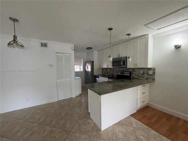 Photo - 104 Gardens Dr Unit 203