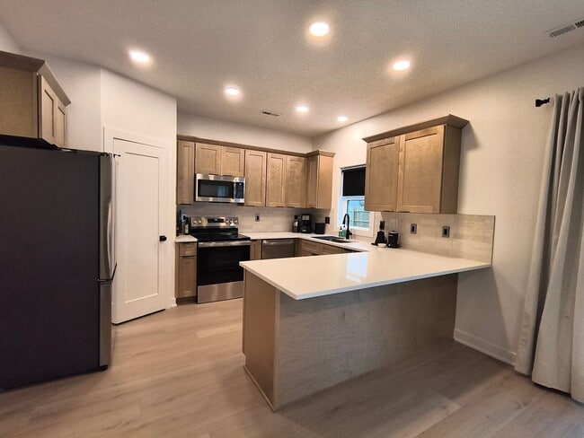 Photo - Modern 3-Bedroom Home Near Lake Manawa – Lake Views & Smart Home Features!