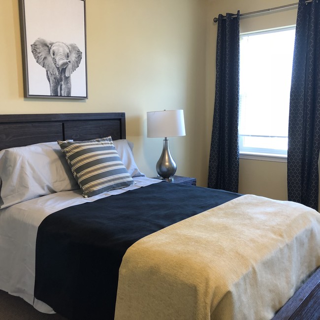 Guest Bedroom Kilburn Court - Northern Pass Luxury Apartments